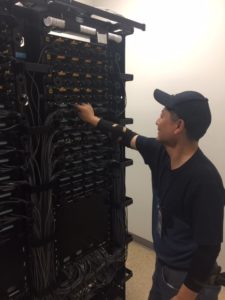 technician doing maintenance in a data center